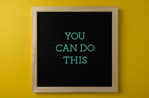 Inspirational message 'You Can Do This' displayed on a blackboard with a bold yellow backdrop.